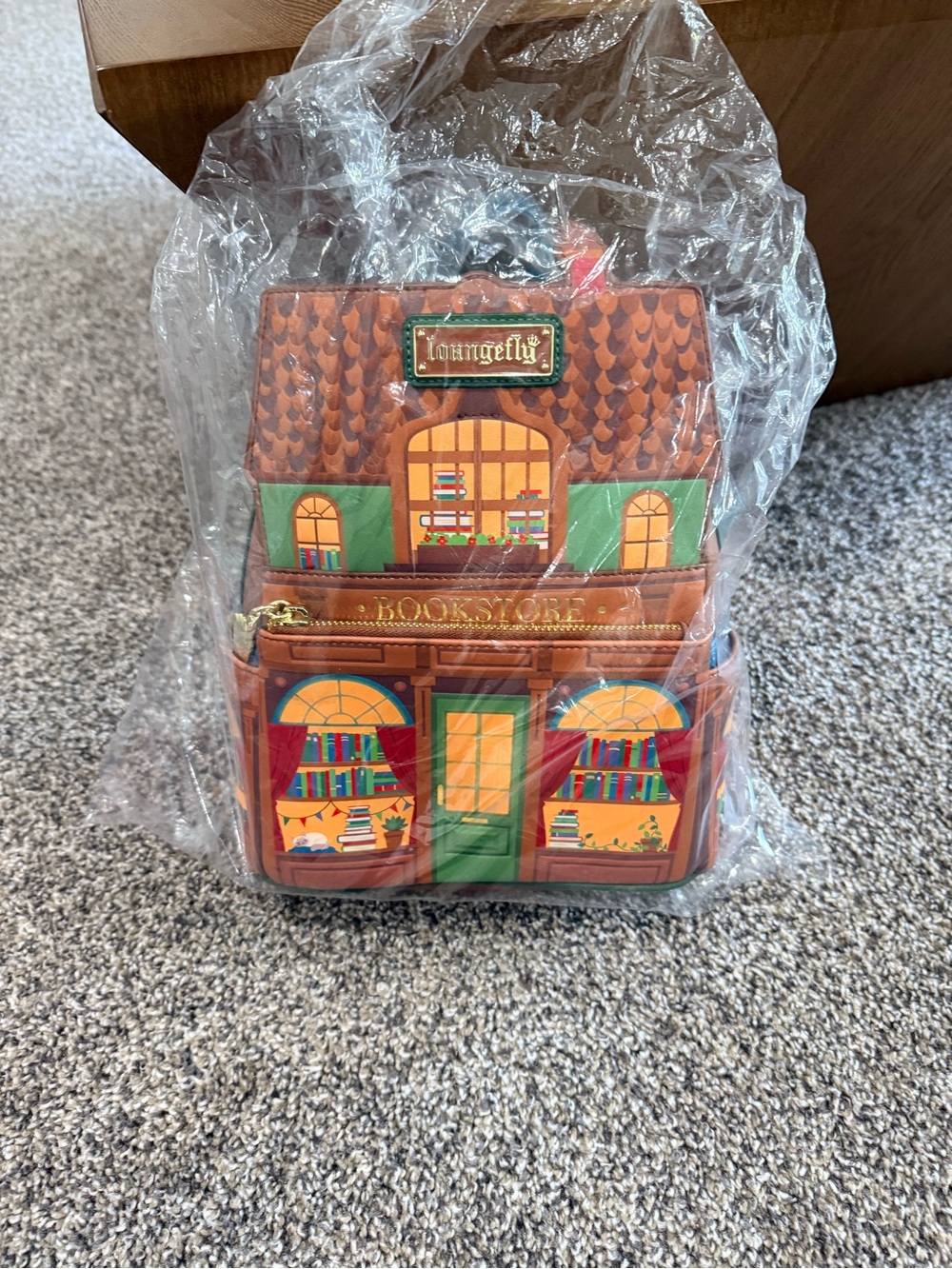 Loungefly Brown Bookstore Mini Backpack with Green and Red Accents